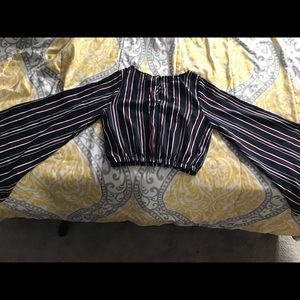 A multi colored flare sleeve top